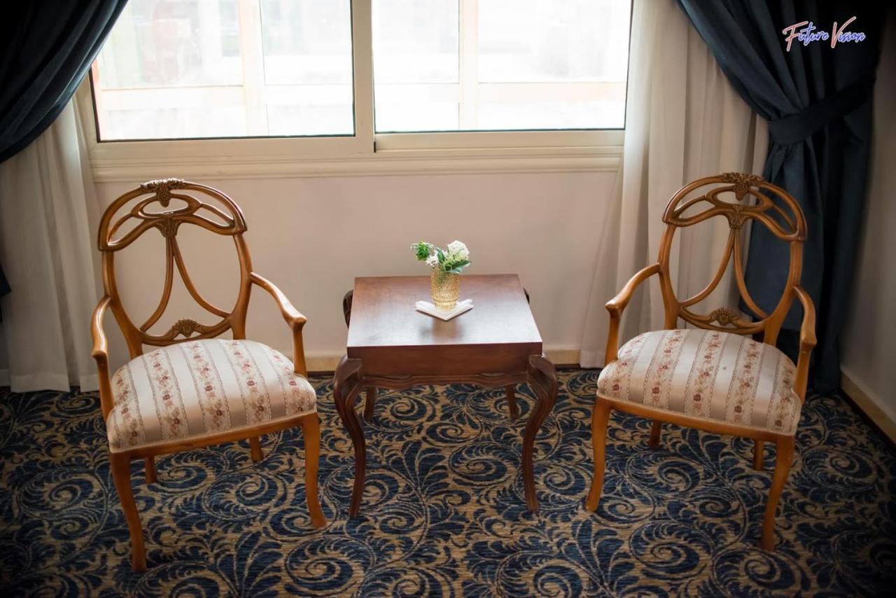 Rehana Plaza Hotel Kairo Exterior foto A pair of armchairs